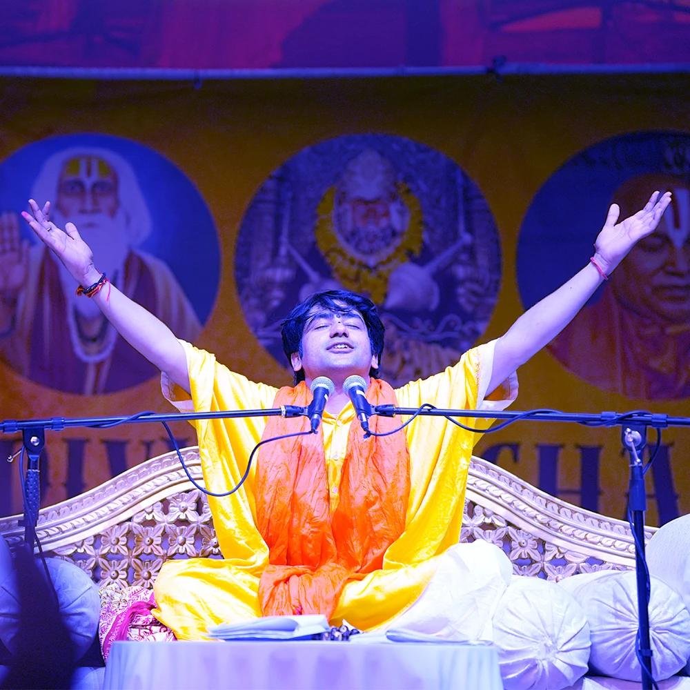 Pujya Gurudev leading a divine gathering